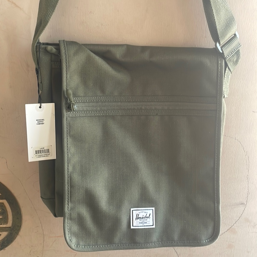 Herschel Messenger bag, new . Olive